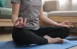 © wattana - Healthy woman practicing yoga at home, sitting in lotus pose to meditation. Healthy lifestyle, meditation concept.