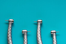 Flat Lay Of Dental High-speed Handpieces On The Blue Background