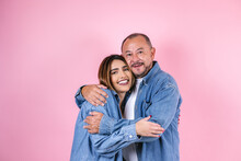 Latin Father And Daughter In Casual Clothes In A Copy Space On Pink Background In Mexico Latin America