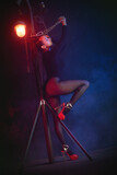 Fototapeta Konie - Beautiful girl dancer in the neon lights concept.