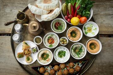 Wall Mural - mixed middle eastern meze sharing food platter in turkish restaurant