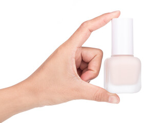 Wall Mural - Hand holding Foundation cosmetic bottle isolated on white background.