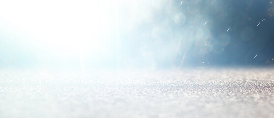 Wall Mural - background of abstract bluer and silver glitter lights. defocused