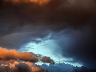 Wall Mural - Colored Clouds at Sunset