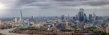 Elevated Panorama Of The London Skyline From London Bridge To The City During A Moody Day With Gray Clouds, England