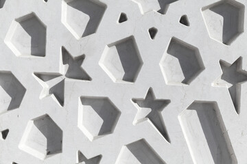 Wall Mural - Abstract white Arabic pattern, close up background texture. Mosque wall