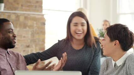 Aufkleber - A group of businesspeople brainstorming during a meeting. A diverse group of corporate businesspeople planning during a meeting, talking and laughing. A group of happy businesspeople talking