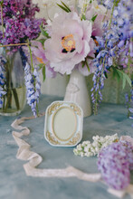 Floral Decor And Decoration For The Holiday, Flowers And A Frame For A Number Or Photo