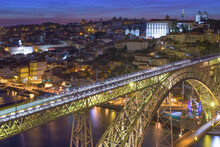 Aerial View Of Dom Luis I Bridge Across The Douro River At Night,  Porto, Portugal
