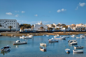 Wall Mural - Fishing boats docked in bay. Arrecife town. Lanzarote Island