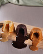 Three types of petit gateau, chocolate, dulce de leche and white chocolate. Copy space