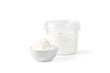 Stracciatella cheese isolated on white. Italian Stretched curd cheese product Stracciatella in bowl and plastic jar.