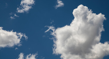 Wall Mural - Beautiful blue sky with fluffy clouds