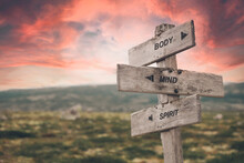Body Mind Spirit Text Quote Caption On Wooden Signpost Outdoors In Nature. Stock Sign Words Theme.
