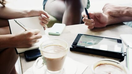 Aufkleber - Hands of architects using wireless digital devices while brainstorming in a meeting at a cafe. A diverse group of businesspeople in a meeting collaborating and planning using a wireless tablet