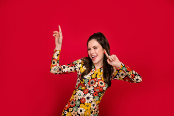 Sticker - Portrait of attractive cheerful girly craefree girl dancing having fun old school rest isolated over bright red color background