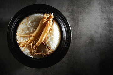 Canvas Print - Stone pot rice topped with ginseng