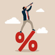 © Vadym - Search for investment profit or banking loan payment concept, Interest rate forecast, Central bank financial policy,  confident businessman climb up percentage sign see vision on telescope.