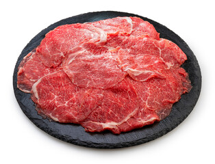 Wall Mural - Rare Sliced Wagyu beef with marbled texture on black plate on white background, Red beef Sliced Asian shabu shabu Sukiyaki food style on white background.