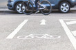 © Maryana - Bicycle lane mark on the city cycle lane in road. Road markings  cycle. Bike path.