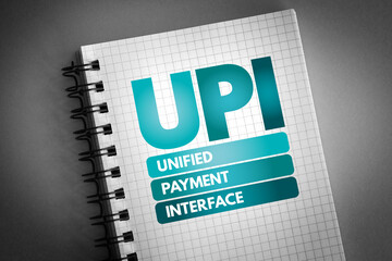 Poster - UPI - Unified Payment Interface acronym on notepad, business concept background