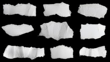 A White Piece Of Paper On A Black Isolated Background