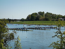 Sports Event "115. Große Bremer Ruder-Regatta" On Lake Werdersee. Rowing Championship. . A Regatta Race Under Blue Sky And Sun. Bremen, Germany