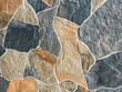 A natural stone surface or background. Tile flooring.