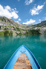 Wall Mural - boat ride on oeschinensee (oeschinen lake), kandersteg, bernese oberland, switzerland
