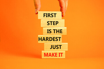 Wall Mural - Make first step symbol. Wooden blocks with words First step is the hardest just make it. Beautiful orange table orange background. Businessman hand. Business and make first step concept. Copy space.