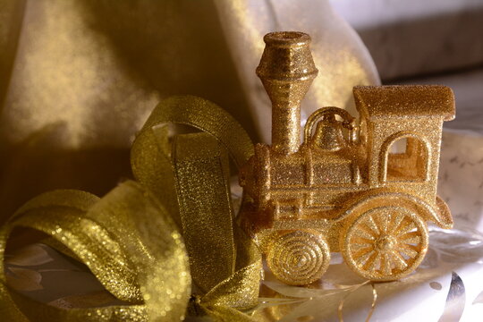 golden Christmas tree toys and gifts new year close-up gold. High quality photo