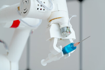 Poster - Robot hand with a medical syringe. Future medicine concept using robots and artificial intelligence