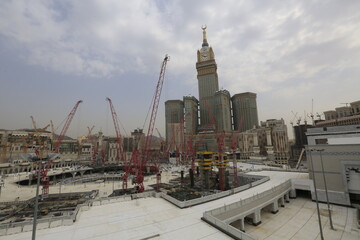 Holy place kaaba and minarets, zamzam tower in the background