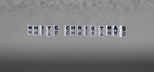 white christmas word or concept represented by black and white letter cubes on a grey horizon background stretching to infinity