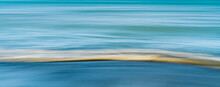 Intentional Camera Movement Of Waves On The Beach
