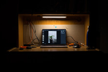 Computer Editing Photo In Dark Room