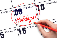 Hand Drawing A Red Circle And Writing The Text Holidays On The Calendar Date 9 February. Important Date.