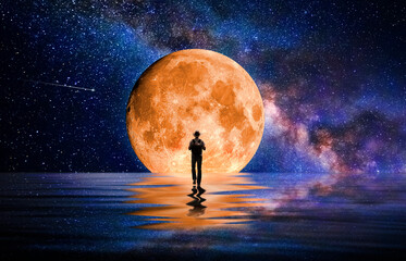 Wall Mural - man walking towards the full moon