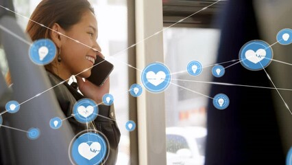 Poster - Animation of network of connections with icons over asian woman talking on smartphone