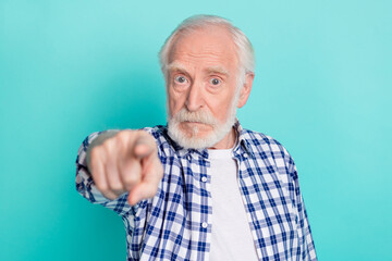 Wall Mural - Photo of serious negative mood grandfather misunderstanding blaming you isolated on teal color background