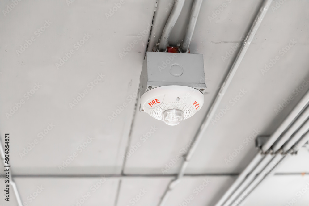 fire detector at ceiling, smoke and flame alarm sensor in commercial building safety equipment