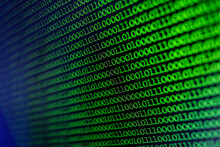 Binary Code Background. Technology Abstract Green Background, Green Binary Code On Computer Screen Texture Background. An Image Of A Binary Code Made Up Of A Set Of Green Digits On A Black Background