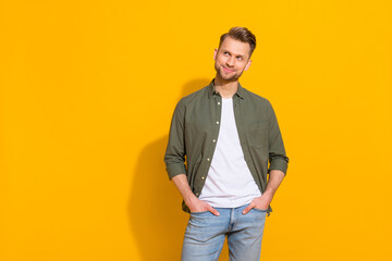 Wall Mural - Portrait of attractive cheery minded sly guy making decision copy space ad isolated over vibrant yellow color background