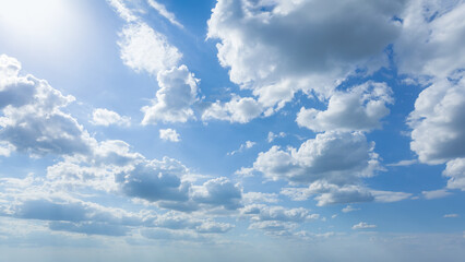 Wall Mural - blue sky with clouds at beautiful sunny day as natural background.