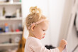 © satura_ - Cochlear implant for baby. Deaf child with hearing aid. Health care and medicine technology and innovations