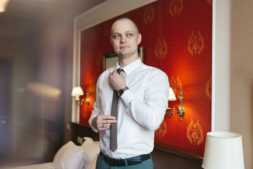 Sticker - Groom tightens his tie on the wedding day