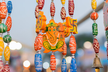 Colorful dolls made of clay, Lord Ganesha, handicrafts on display during the Handicraft Fair in Kolkata , earlier Calcutta, West Bengal, India. It is the biggest handicrafts fair in Asia.