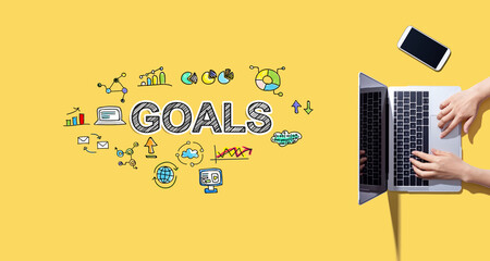 Poster - Goal concept with person working with a laptop