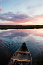 Canoe At Sunset