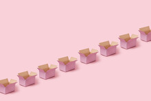 Open Parcel Boxes On Pink Background